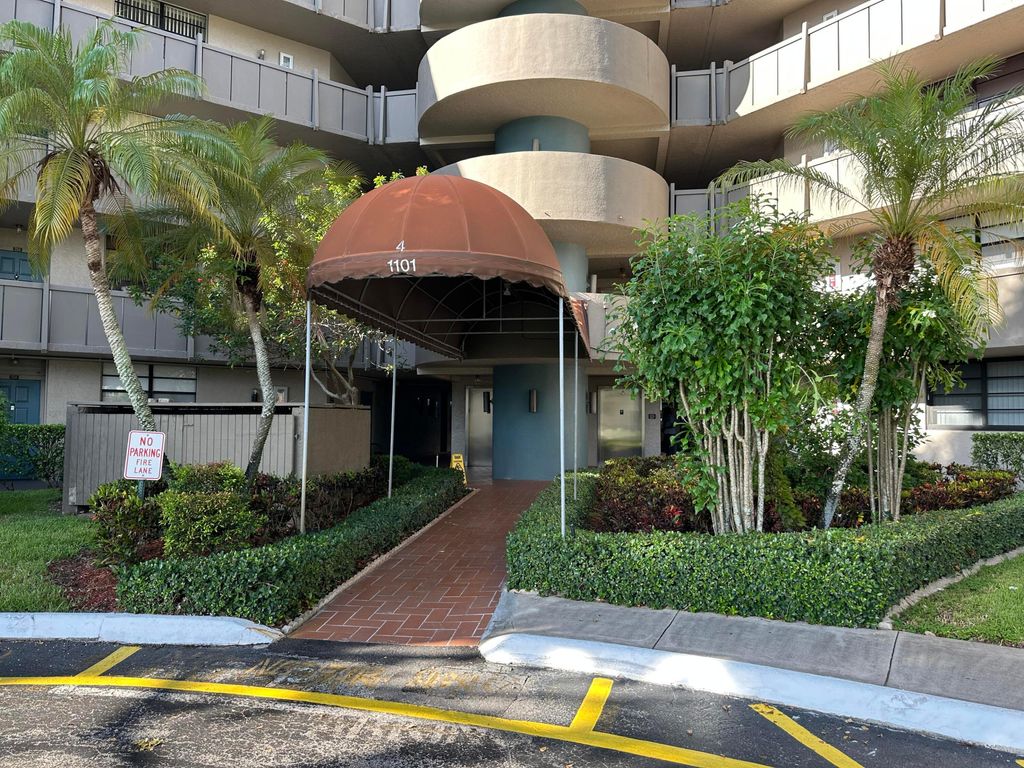 Photo of 1101 Colony Point Circle #108, Pembroke Pines, FL 33026 (MLS # R11161391)