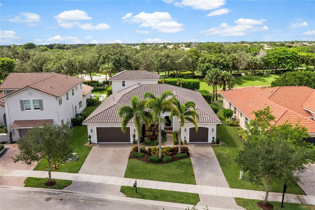 Photo of 12014 NW 79th Court, Parkland, FL 33076 (MLS # F10523323)