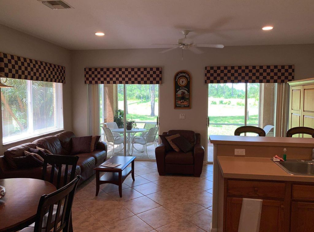 Photo of 8350 Mulligan Cir #A, Port St Lucie, FL 34986 (MLS # R10894682)