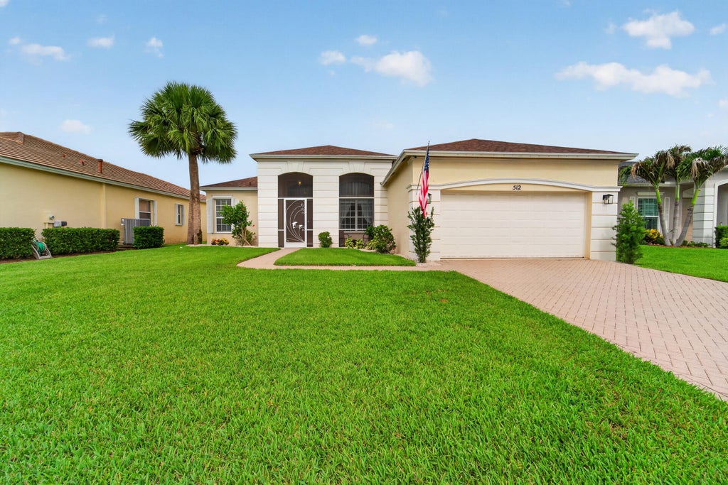 Photo of 512 SW Lake Manatee Way, Port Saint Lucie, FL 34986 (MLS # B26081818)
