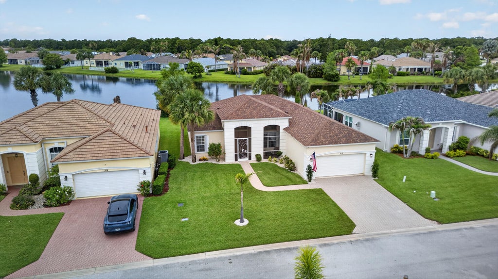 Photo of 512 SW Lake Manatee Way, Port Saint Lucie, FL 34986 (MLS # B26081818)