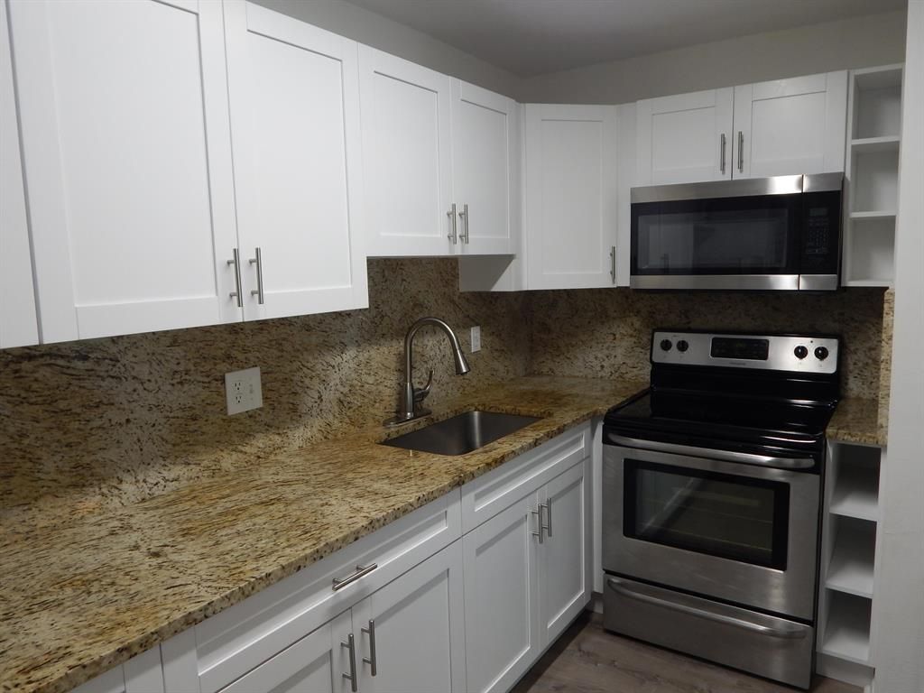 Photo of 322 Lake Frances Drive, West Palm Beach, FL 33411 (MLS # R10775403)