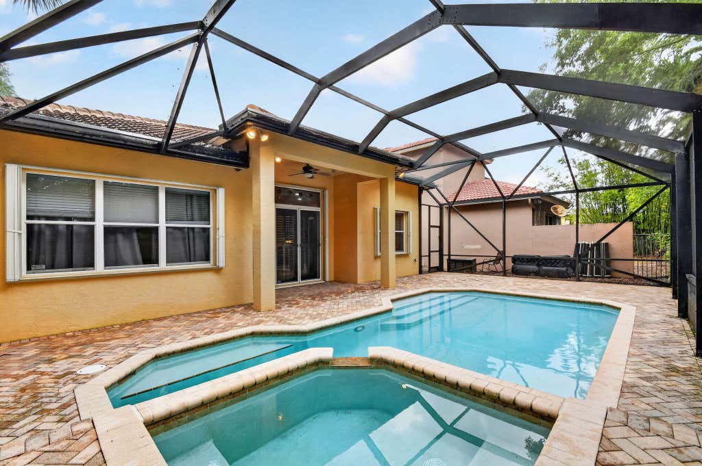 Photo of 10247 Isle Wynd Court, Boynton Beach, FL 33437 (MLS # B26043119)