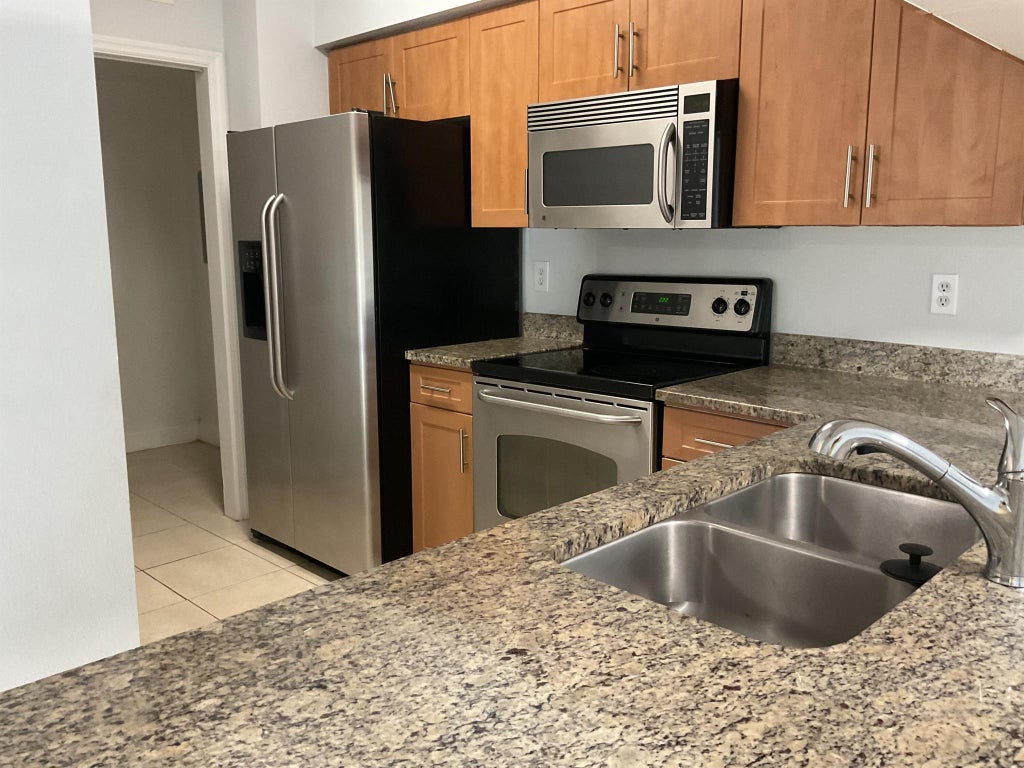 Photo of 6510 Emerald Dunes Drive #202, West Palm Beach, FL 33411 (MLS # R11092890)