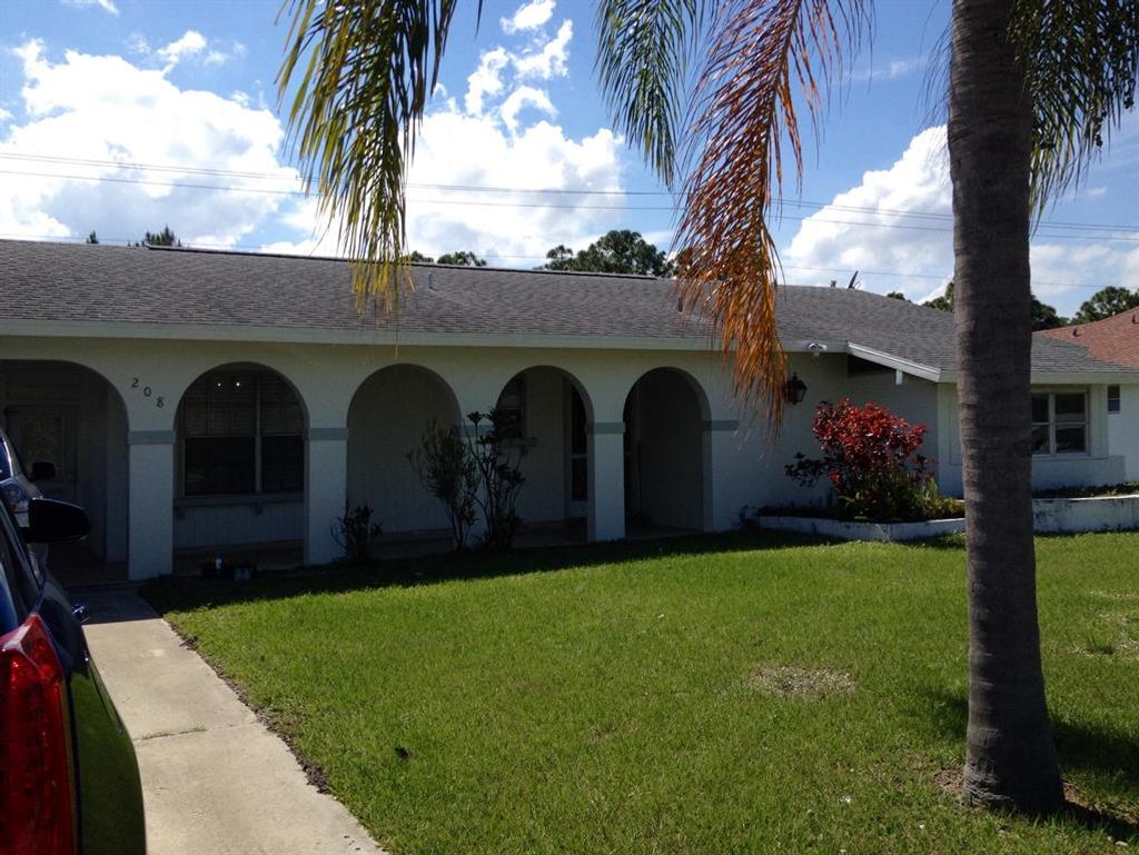 Photo of 208 NW Airoso Boulevard, Port Saint Lucie, FL 34983 (MLS # R10758789)