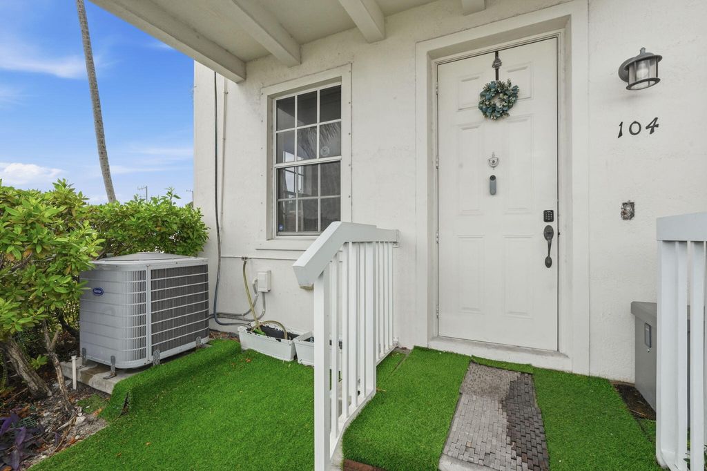 Photo of 310 N Dixie Highway #104, Lake Worth Beach, FL 33460 (MLS # B26024625)