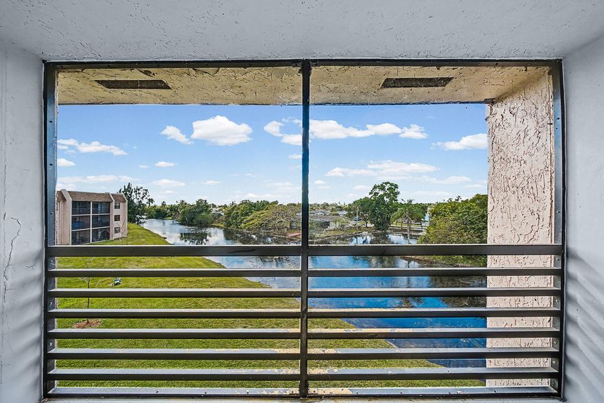 Beautifully priced corner-unit 2-bedroom, 2-bath condo in the highly desirable Sunrise Lakes 55+ community, Step outside onto your balcony overlooking the lake, perfect for morning coffee or sunset relaxation in true South Florida style. The bright open 850 sq ft layout includes a spacious living and dining area ideal for entertaining or relaxing, generously sized bedrooms, and ample storage throughout with great natural light. Resort-style amenities include pools, clubhouse, and fitness center. Conveniently located near shopping, dining, medical facilities, and major highways.Ideal as a full-time residence or seasonal retreat. Motivated seller — priced to sell. Easy to show!