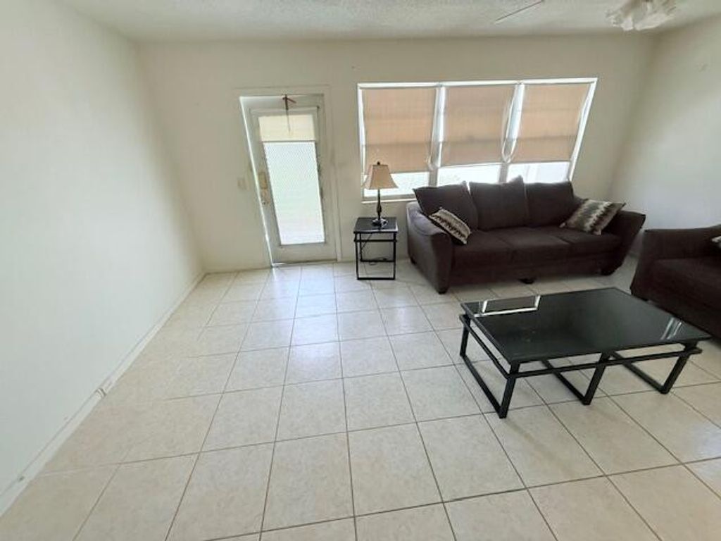 Photo of 128 Upminster F Crescent, Deerfield Beach, FL 33442 (MLS # B26025607)