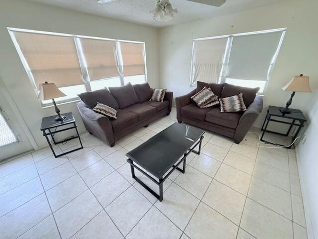 Photo of 128 Upminster F Crescent, Deerfield Beach, FL 33442 (MLS # B26025607)