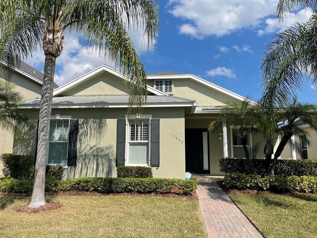 Photo of 10668 SW Westlawn Boulevard, Port Saint Lucie, FL 34987 (MLS # R10702655)