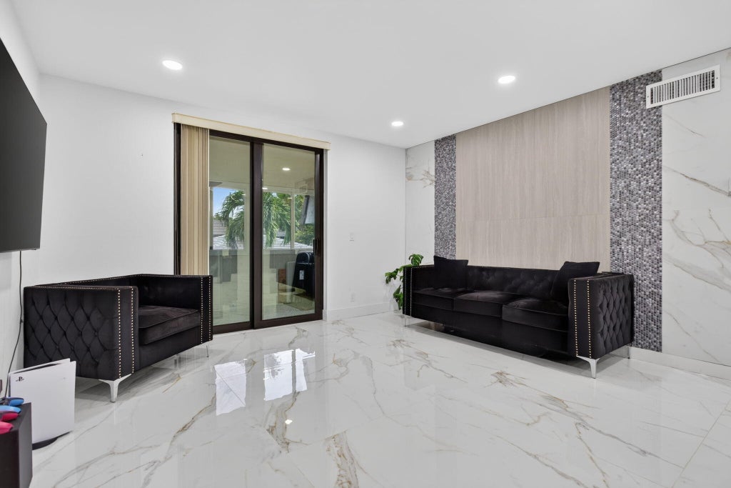 Photo of 8404 W SAMPLE Road #230, Coral Springs, FL 33065 (MLS # B26072838)