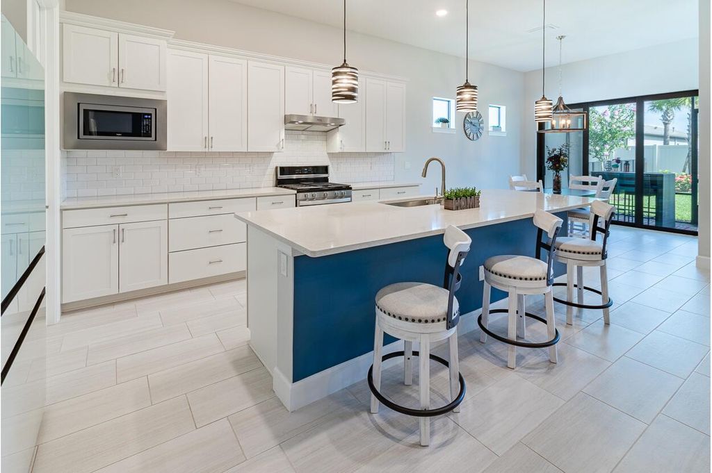 Photo of 539 SE Villandry Way, Port Saint Lucie, FL 34984 (MLS # R11006818)