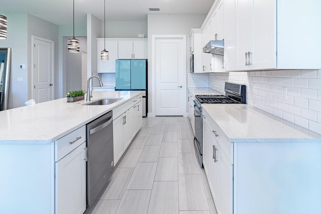 Photo of 539 SE Villandry Way, Port Saint Lucie, FL 34984 (MLS # R11006818)