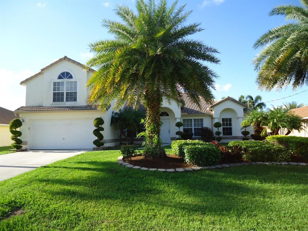 Photo of 5824 NW Zenith Drive, Port Saint Lucie, FL 34986 (MLS # R10790291)