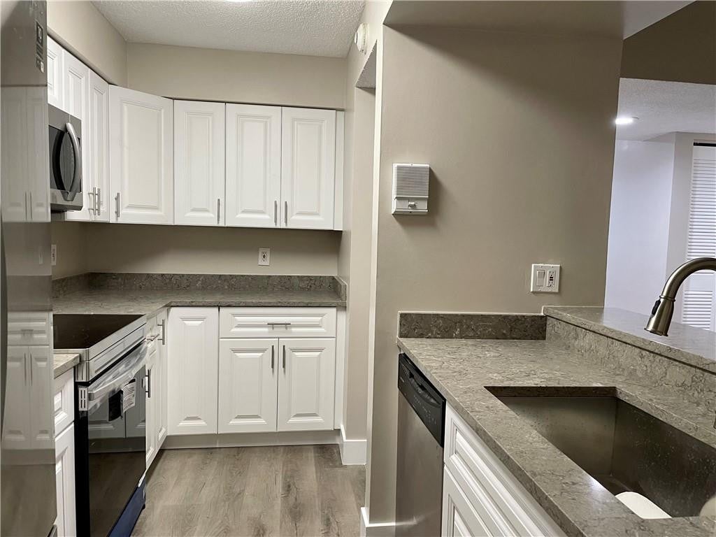 1674 NW 81ST Way 1674, Plantation, FL, 33322/$309,999 3 1674 NW 81ST Way 1674