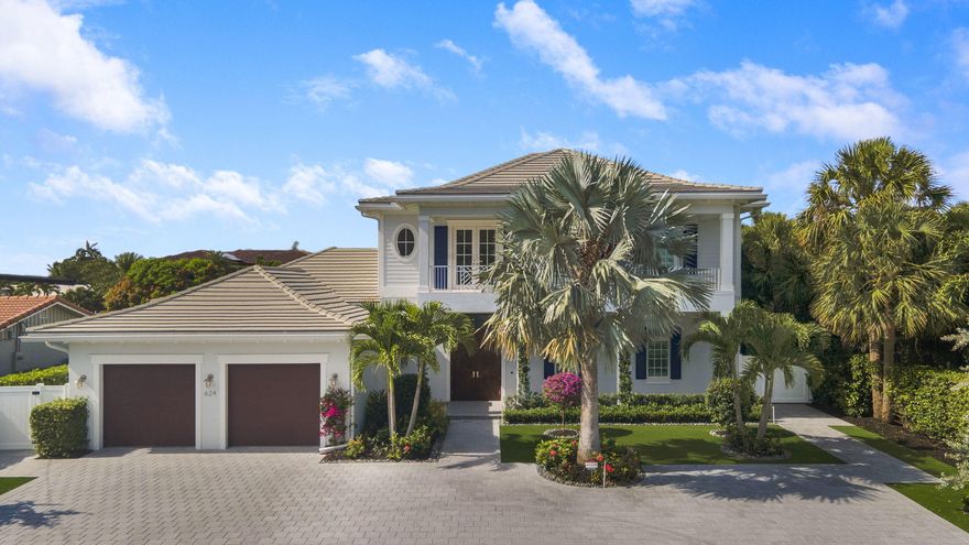 Incredible, professionally decorated custom  pool home with no fixed bridges and countless upgrades!  British West Indies/Key West design.  4 bedrooms, each with its own full bath and closet with custom closet system in place.   Beautifully coffered ceiling in the open concept main living area. All impact windows and doors with electric shades in the main living area and master bedroom.Hardwood floors throughout. Gorgeous chef's kitchen with Jen Air SS appliances, gas range, double oven, farm sink, over sized island, wine fridges, and a huge pantry. Down stairs and upstairs laundry with a main floor master bedroom suite. Insane pool area with marble decking, complete infinity pool and spa with vanishing edge,sunshelf area, glass bead pool finish, and salt system.Cabana bath and an outdoor shower. Gas enabled tiki torches and a fire pit accent the 90 feet of waterfront w 16k boat lift. lights under the dock, ramps for access to the boat area.  No fixed bridges and room for up to 60' boat. Lush landscaping with a combination of natural grass and turf. Beautifully upgraded driveway pavers, exterior lighting package and a sophisticated security system.  This home is being sold furnished. Both boat and floating dock are excluded.