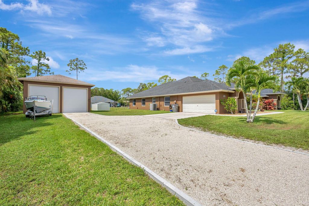Photo of 12098 86th Road N, The Acreage, FL 33412 (MLS # R11095035)