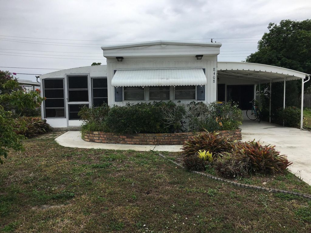 Photo of 8408 SE Swan Avenue, Hobe Sound, FL 33455 (MLS # R10968050)