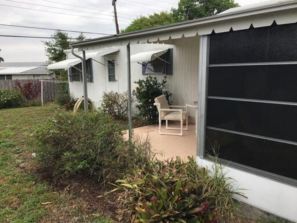 Photo of 8408 SE Swan Avenue, Hobe Sound, FL 33455 (MLS # R10968050)