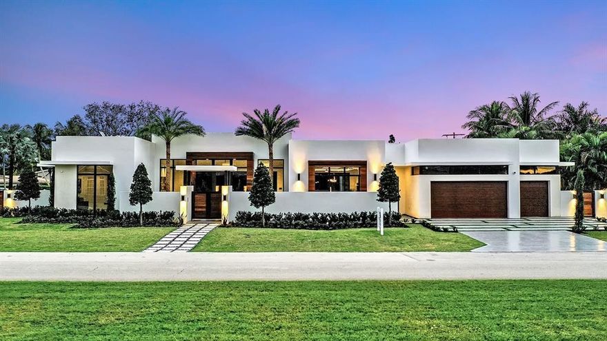 Photos Added! NEW Bella Homes Modern Masterpiece! Designed by Richard Jones Architect, this one-of-a-kind floor plan makes the most of S. Florida living. The living, family, kitchen, great, game and outdoor loggia rooms are open to each other, yet each space is large, functional, and leaves room to spread out. Spectacular attention to detail! The Chef's kitchen features wood trimmed Mia Cucina  Italian modern cabinetry & Miele appliances. Luxurious designer baths. Soaring ceilings & impact glass doors open up to the resort style heated salt water pool, loggia with summer kitchen & drought tolerant landscape package. Smart features include Lutron Home Works with Control 4 panel, Sonos sound system, 4'' trimless LED recessed lighting package, tankless water heaters. Located in the Lake Ida