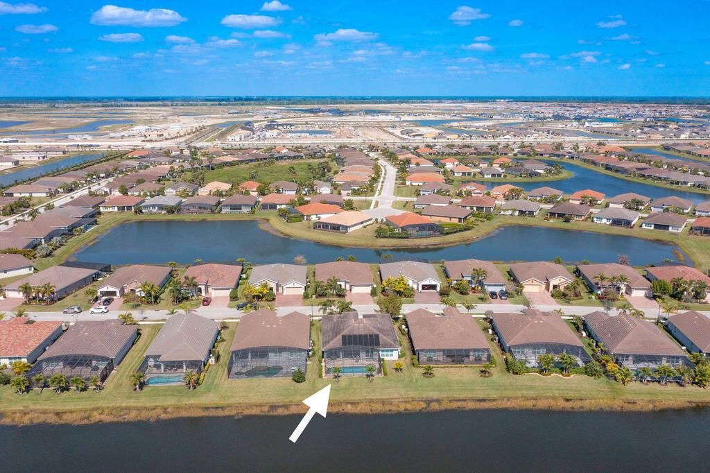 Photo of 9901 SW Coral Tree Circle, Port Saint Lucie, FL 34987 (MLS # R10963879)