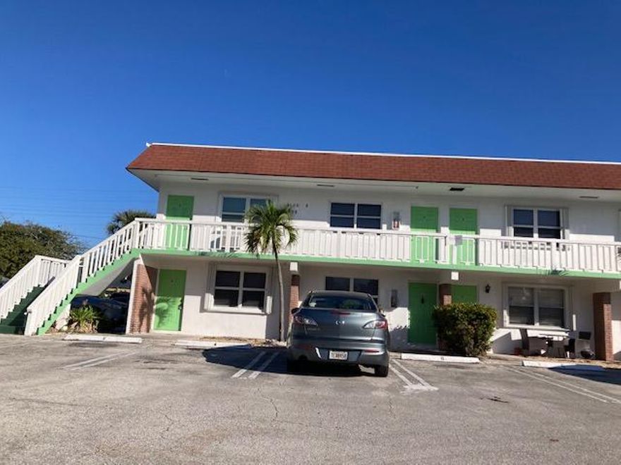 Adorable freshly painted and professionally cleaned, 1/1 first floor corner appt. Updated kitchen and bath. No popcorn ceilings! Ceramic tile thruout. WASHER/DRYER IN UNIT! Walk-in closet. Hurricane windows and shutters. Park outside your door. One car assigned parking and guest parking available. Suitable for only one occupant. All ages community and one pet under 20 pounds considered. Great East location - walk to beach, shopping and restaurants.