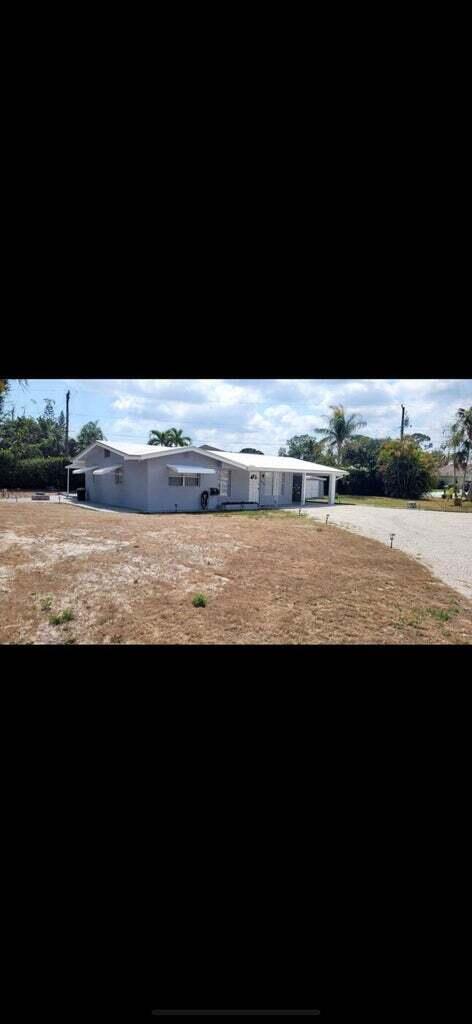 Welcome to 8255 SS Boxwood in the quiet neighborhood of Poinciana Gardens Hobe Sound. This 3 bedroom 1 bath has been just recently updated and ready for you and your family. Enjoy a private backyard with fire pit.