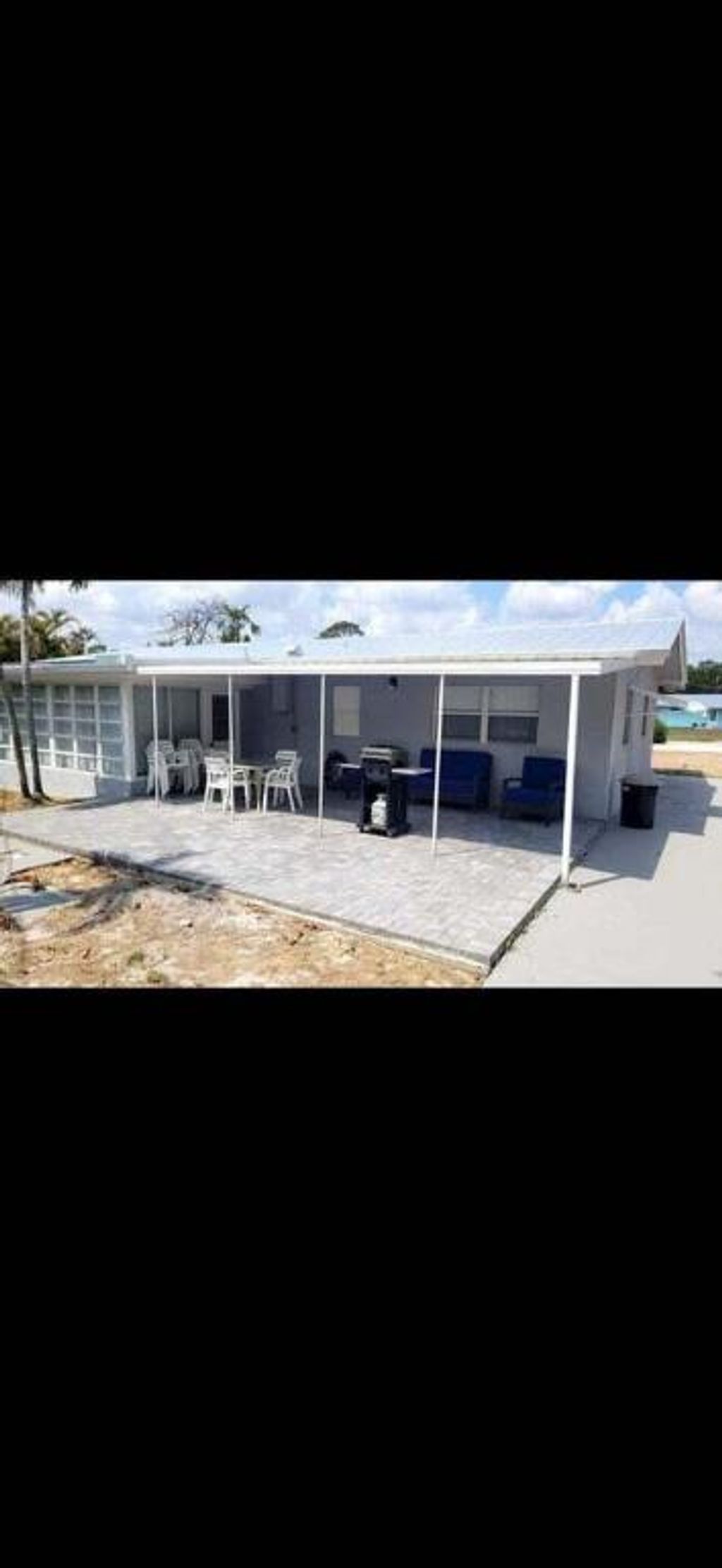 Photo of 8255 SE Boxwood Lane, Hobe Sound, FL 33455 (MLS # R10972437)