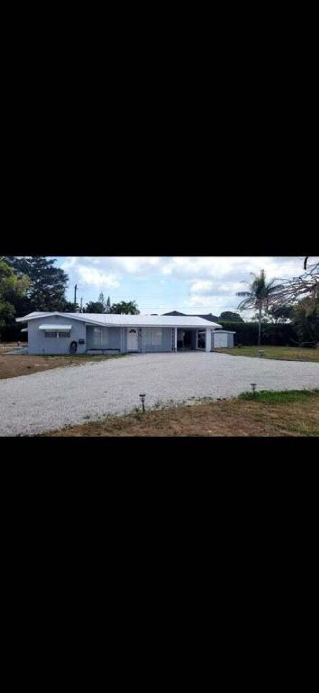 Photo of 8255 SE Boxwood Lane, Hobe Sound, FL 33455 (MLS # R10972437)