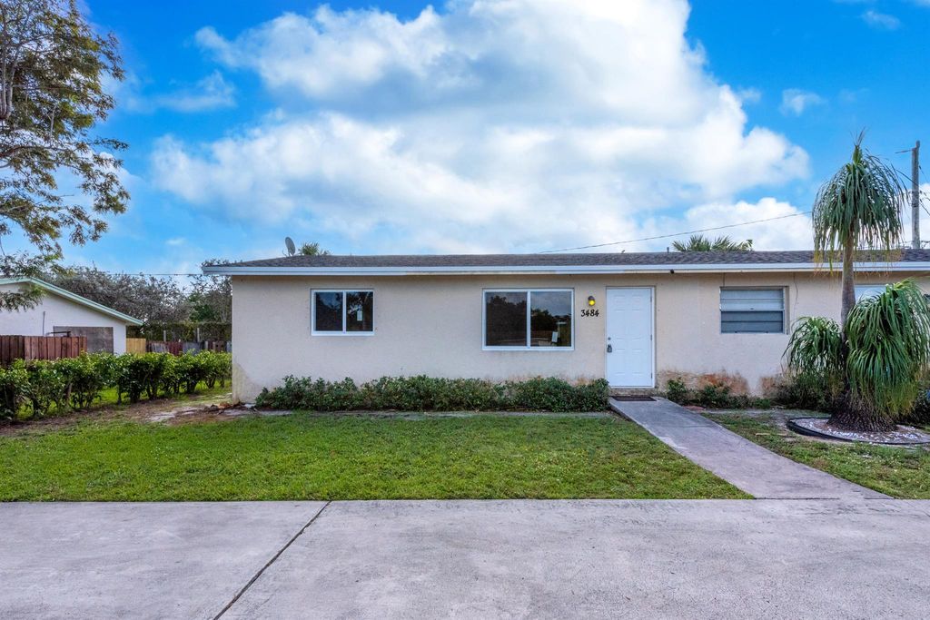 Photo of 3484 48th Lane S, Lake Worth, FL 33461 (MLS # R10996370)