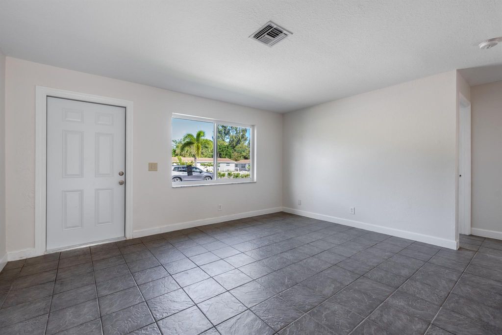 Photo of 3484 48th Lane S, Lake Worth, FL 33461 (MLS # R10996370)