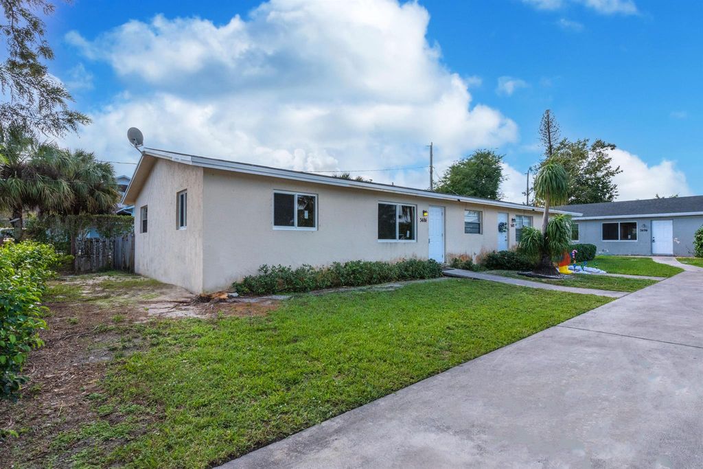 Photo of 3484 48th Lane S, Lake Worth, FL 33461 (MLS # R10996370)