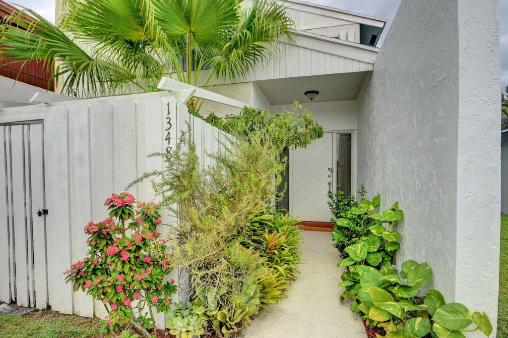 Photo of 1348 The 12th, Wellington, FL 33414 (MLS # B26012347)