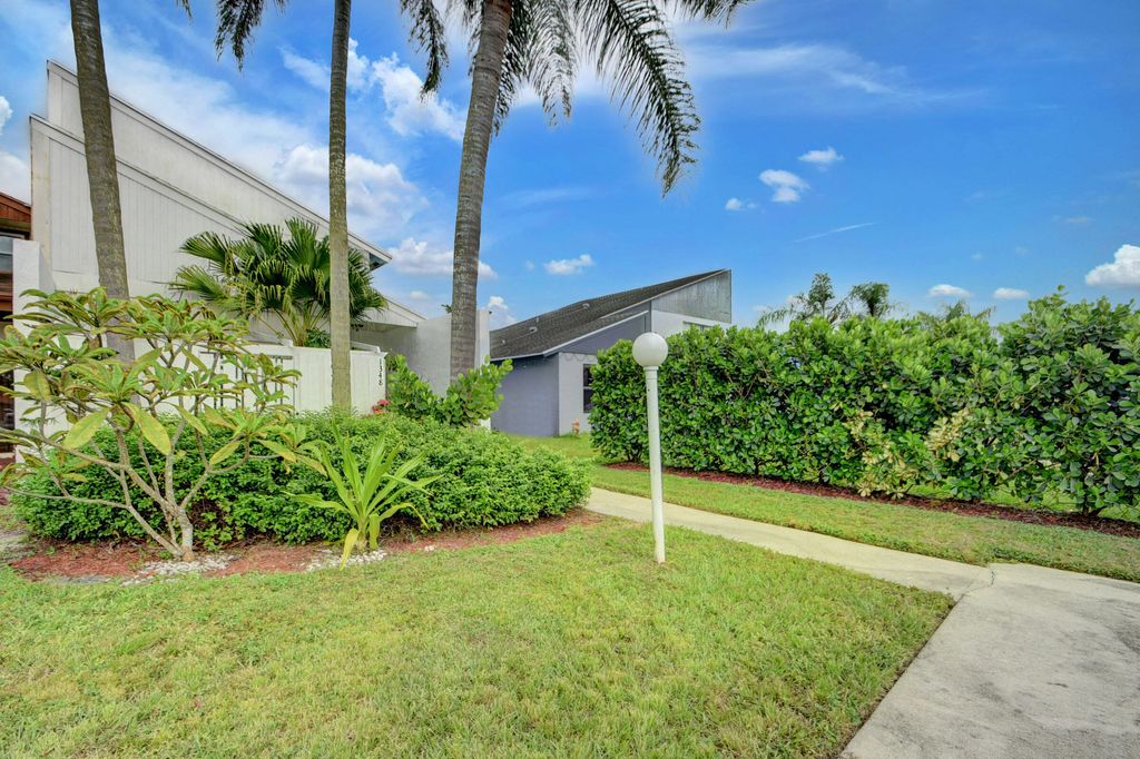 Photo of 1348 The 12th, Wellington, FL 33414 (MLS # B26012347)