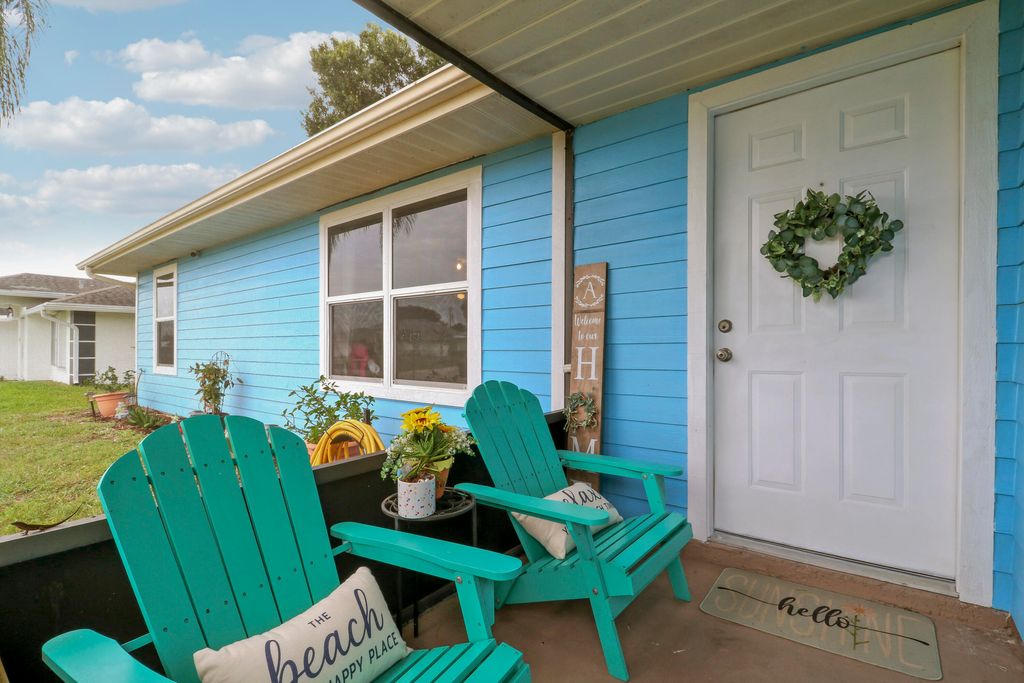 Photo of 4453 SW Bradbury Street, Port Saint Lucie, FL 34953 (MLS # B26039858)