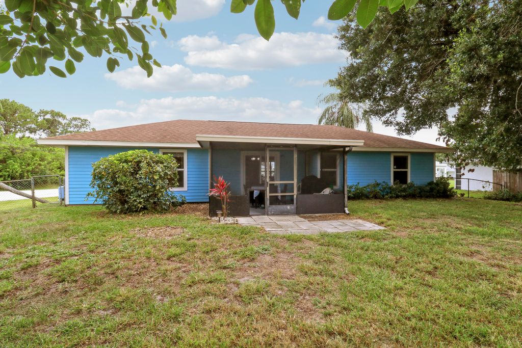 Photo of 4453 SW Bradbury Street, Port Saint Lucie, FL 34953 (MLS # B26039858)
