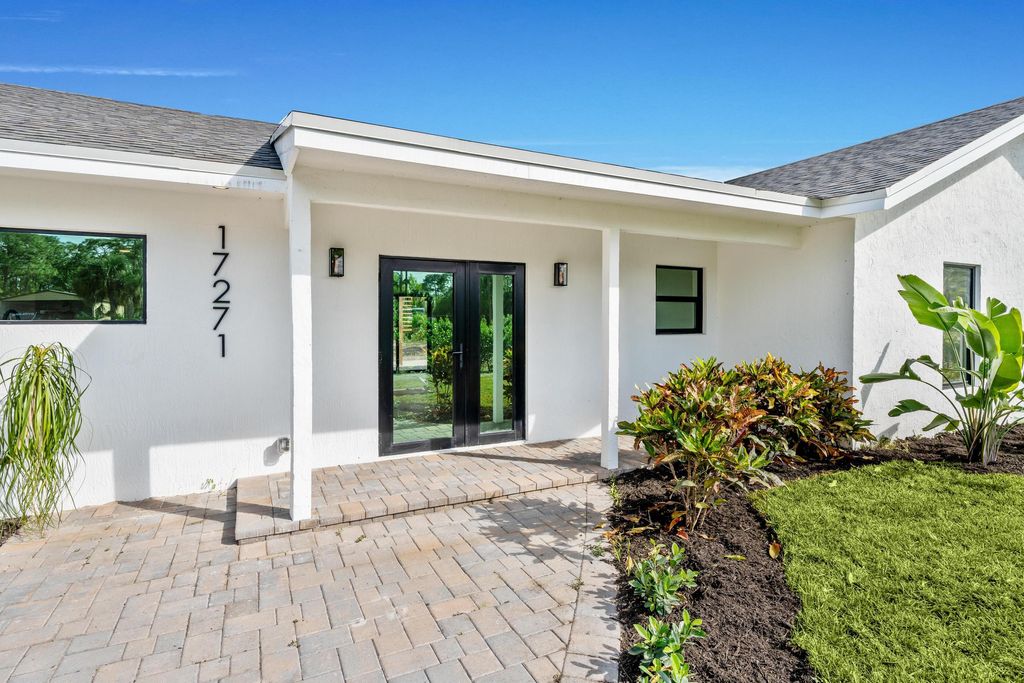 Photo of 17271 Valencia Boulevard, Loxahatchee, FL 33470 (MLS # R11063129)