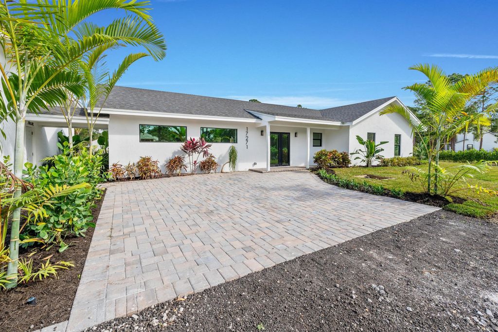 Photo of 17271 Valencia Boulevard, Loxahatchee, FL 33470 (MLS # R11063129)