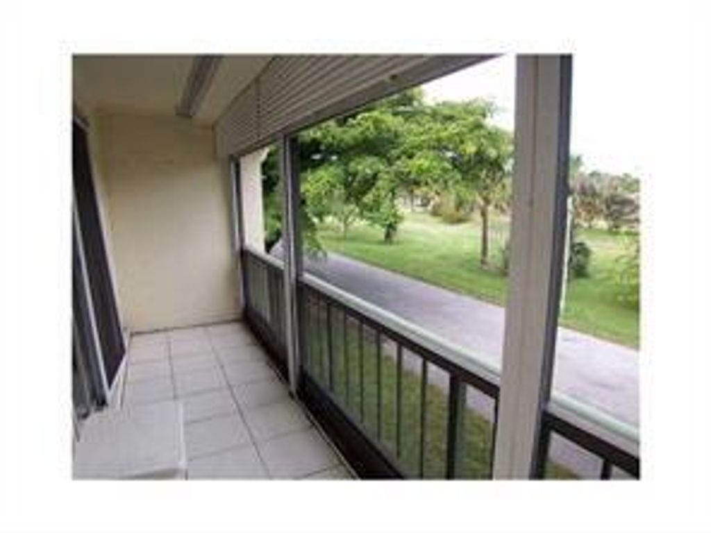 Photo of 4116 NW 88th Avenue #201, Coral Springs, FL 33065 (MLS # B26017150)