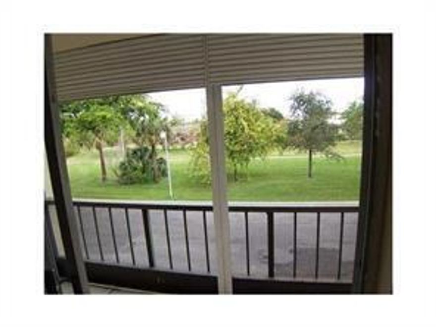 Very nice and clean 1 bed, 1 bath corner unit on the second floor in the best building as it is located on the farthest NE corner of the complex with a lot a privacy as there aren't any other buildings behind. VERY LOW CONDO FEES: ONLY $172/MONTH!! This light and bright unit offers a spacious living/dining area, tile throughout, new A/C, newer stainless steel kitchen sink, newer bathroom sink, master suite that boasts ample natural light and access the balcony. Amenities including a clubhouse, pool, fitness center and tennis courts. This prime location is close to top-rated schools, major roads, worships, restaurants, transportation and the new Coral Springs downtown. Association requires a minimum credit score of 640 for approval.