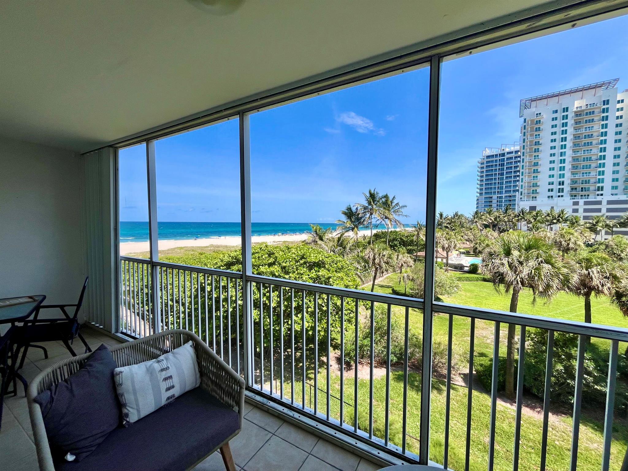 NOW AVAILABLE-BEST VIEWS & UNIT FOR SALE IN VILLAS ON THE OCEAN! Delightfully decorated and fully updated 1/1 w washer/dryer now available. Unobstructed ocean views and overlooking the widespread open gardens of Oceantree. Nothing but views from your screened it spacious balcony. Assigned parking. Guest spaces. Private Beach access and community pool. Unmanned but guard gate. Elevator access to 4th floor and unit is right there. Very convenient to ocean access.