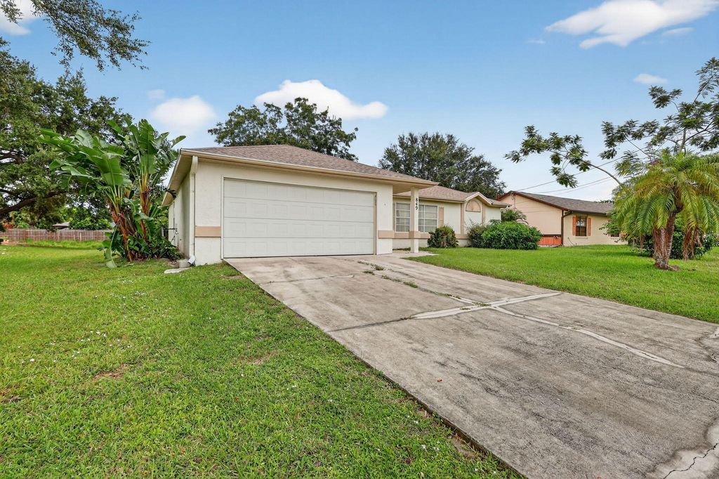 Photo of 849 SW Mccoy Avenue, Port Saint Lucie, FL 34953 (MLS # R11137312)