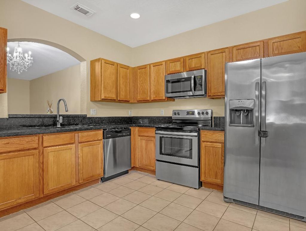 Photo of 2226 Oakmont Drive, Riviera Beach, FL 33404 (MLS # R11133088)