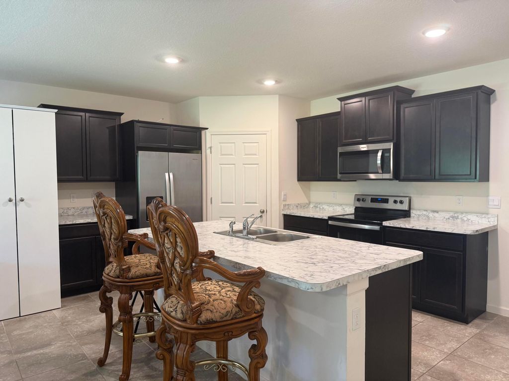 Photo of 2526 SW Savage Boulevard, Port Saint Lucie, FL 34953 (MLS # B26017397)