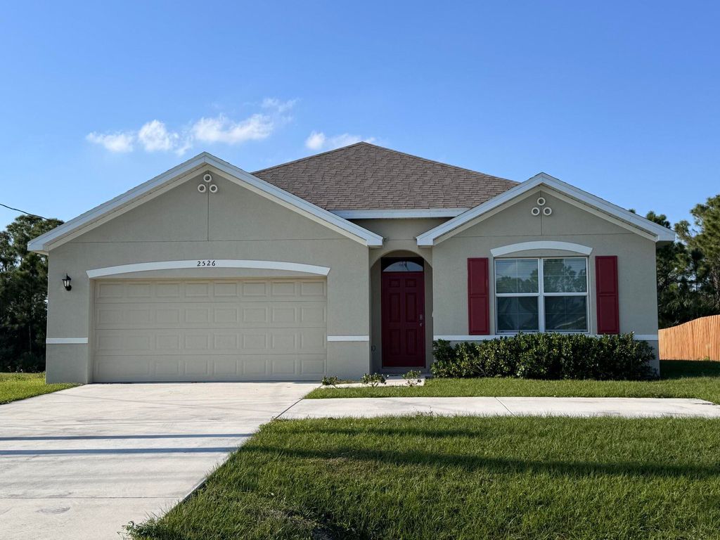 Photo of 2526 SW Savage Boulevard, Port Saint Lucie, FL 34953 (MLS # B26017397)