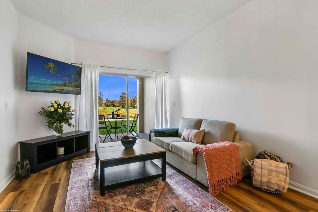 Photo of 2040 Greenview Shores Boulevard #203, Wellington, FL 33414 (MLS # B26029042)