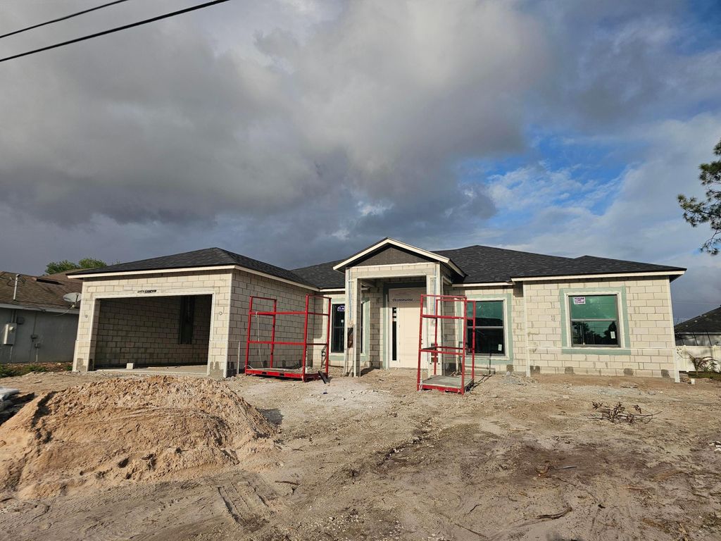 Photo of 4625 SW Cacao Street, Port Saint Lucie, FL 34953 (MLS # B26014174)