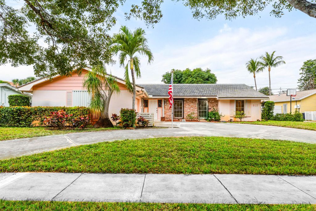 Photo of 817 Westwind Drive, North Palm Beach, FL 33408 (MLS # R11158644)