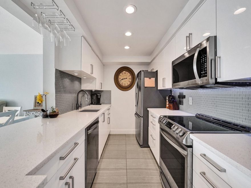 Welcome to River Reach, this newly vacant, waterfront condo in desirable East Fort Lauderdale is on the market and offering the perfect blend of comfort, convenience, and coastal living. This spacious residence features 2 beds, 2 baths, an open-concept living and dining area, and large windows that fill the home with natural light. The updated kitchen includes custom cabinetry, generous counter space, and modern appliances. Enjoy peaceful waterfront views from the living area and private balcony, with no fixed bridges and ocean access. Tile flooring throughout, central A/C, ample closet space, and assigned parking. The well-maintained community offers updated pool areas, recently redone balconies and windows, and can BE RENTED IMMEDIATELY. Close to airport, beaches, dining and shopping.