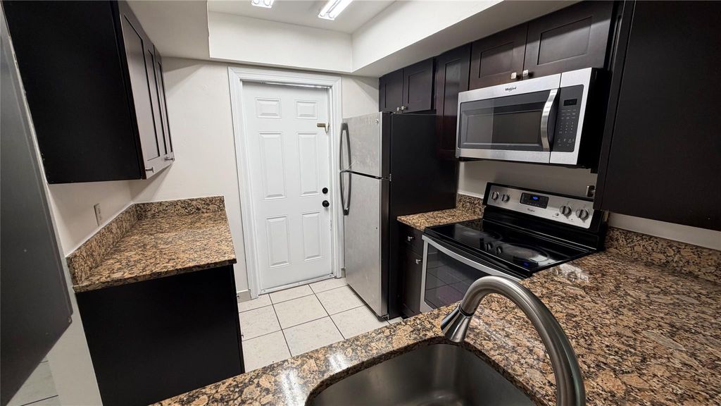 Photo of 4061 NW 9th Avenue #105, Deerfield Beach, FL 33064 (MLS # F10537817)